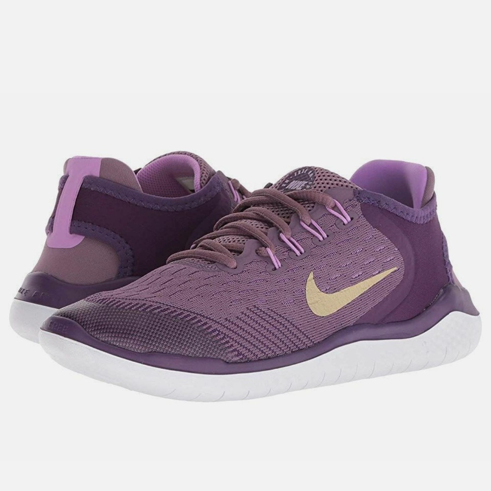 Nike Purple and Gold Athletic Shoes